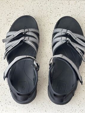 Teva womens Black and white Sandals in size 11